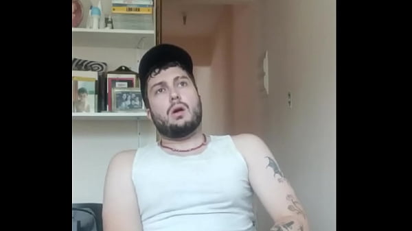 Tattooed white guy jerking off until he cums