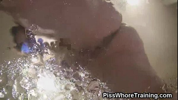 Cute teen pisses on camera lens